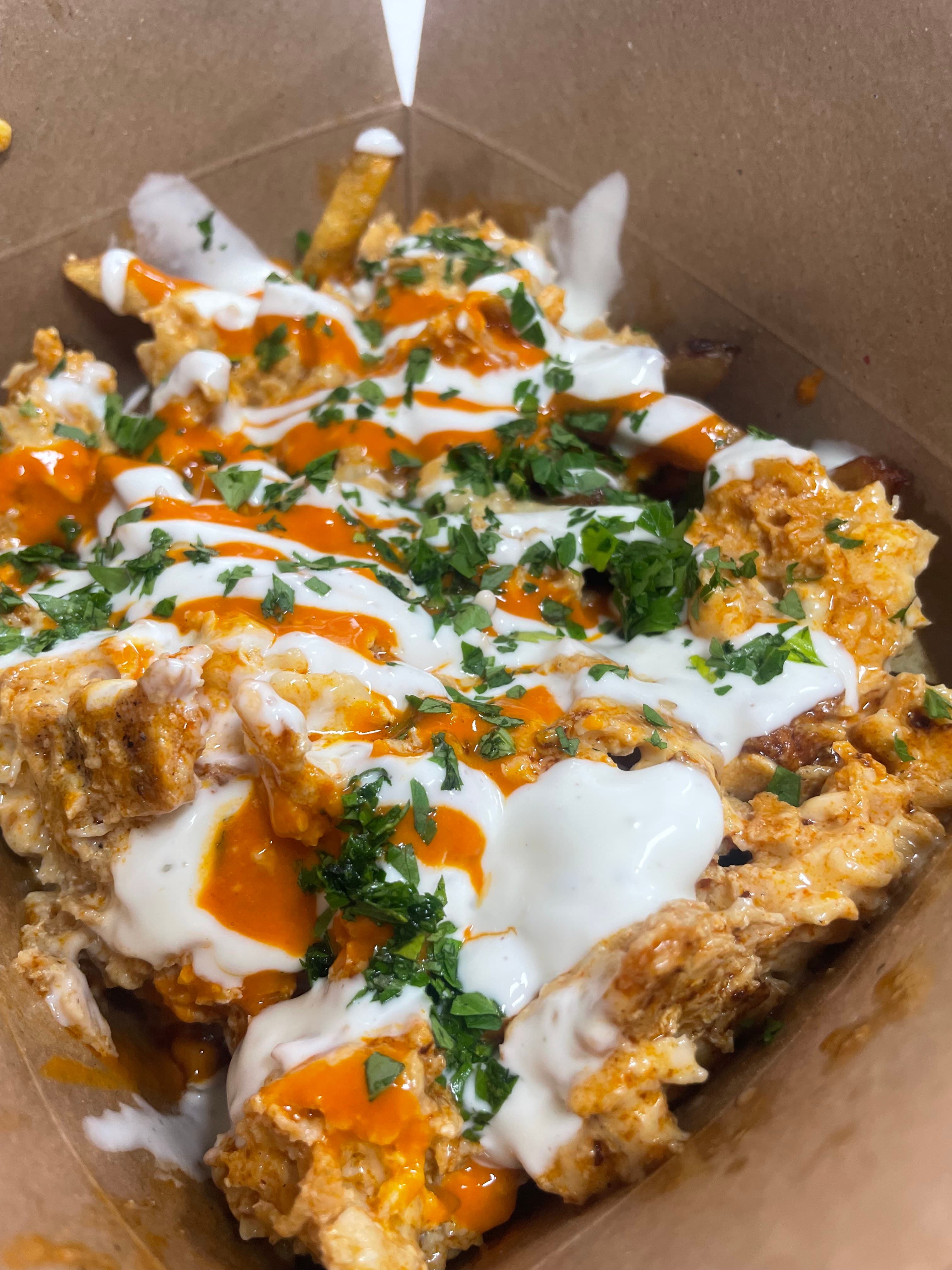 Loaded fries with herbs